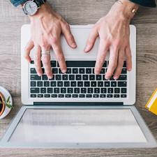 Man banking on laptop