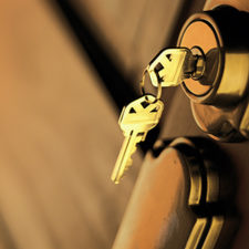 Close up of keys in a deadbolt lock on a door
