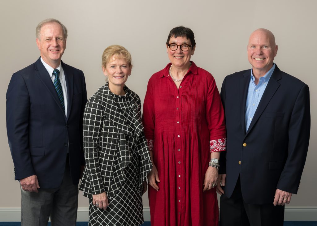 The Coop President & CEO, Lisa Oliver with three new elected Board Members, Gene Guill, Sarah Alger, and Bill Varga