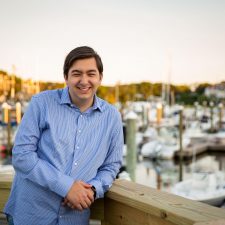 Jon Watkins, owner of JFW Photography, pictured in front of harbor