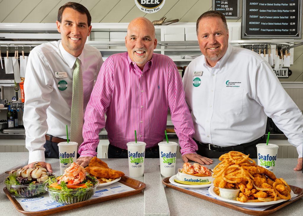 Seafood Sam's Falmouth Owner Mike Lewis with The Coop