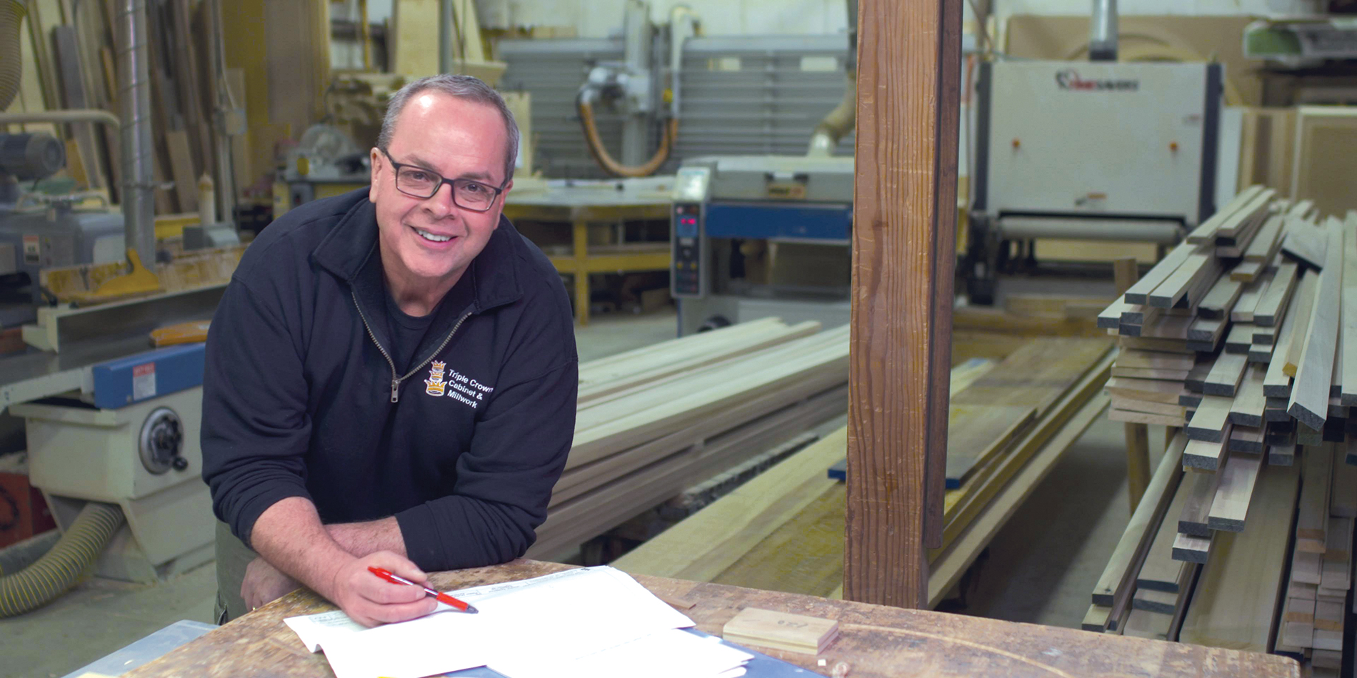 Wayne Paciocco, owner of Triple Crown Cabinets and Millwork in Sandwich poses in his woodworking shop