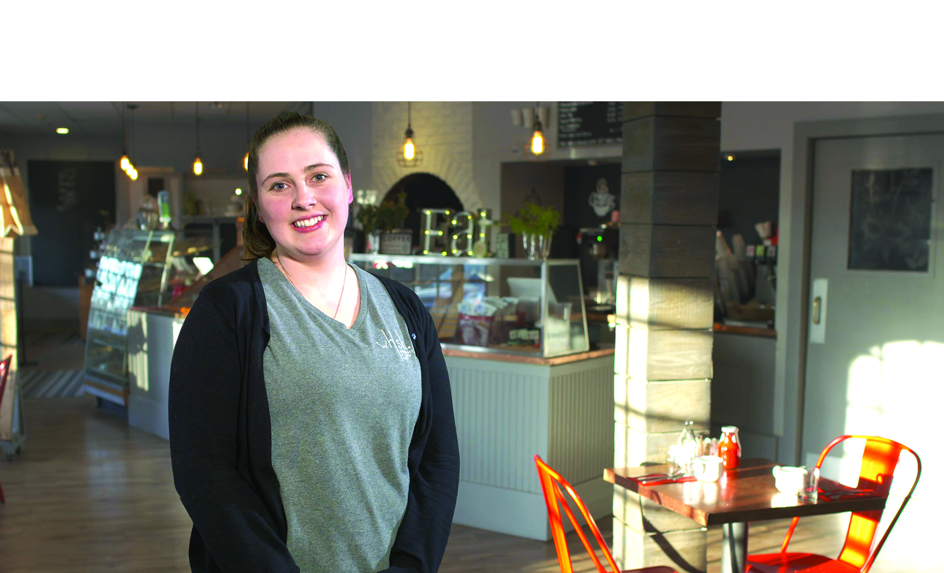 Brittany Woodward, owner of Whisk Breakfast & Lunch Cafe in Orleans, stands in her cafe