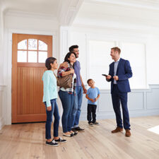 Family meeting with realtor in rental home
